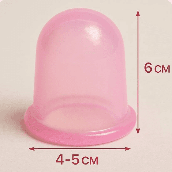 Translucent pink silicone massage cup measuring 6 cm in height and 4-5 cm in width.
